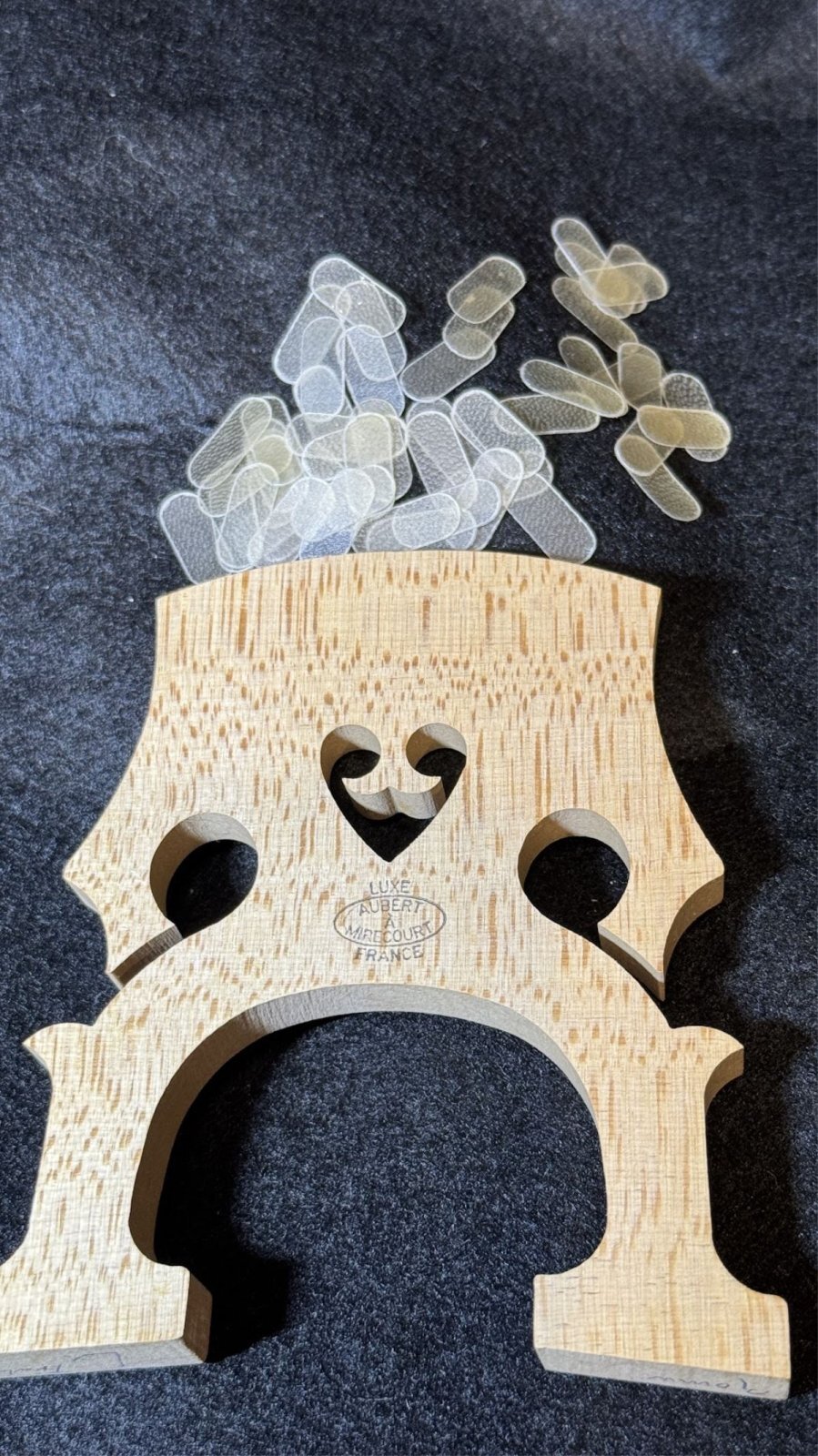 画像: チェロ用成形済駒プロテクタ皮5枚セット VcPre-Shaped Skin protector for bridge 5pc.set  駒革 駒皮